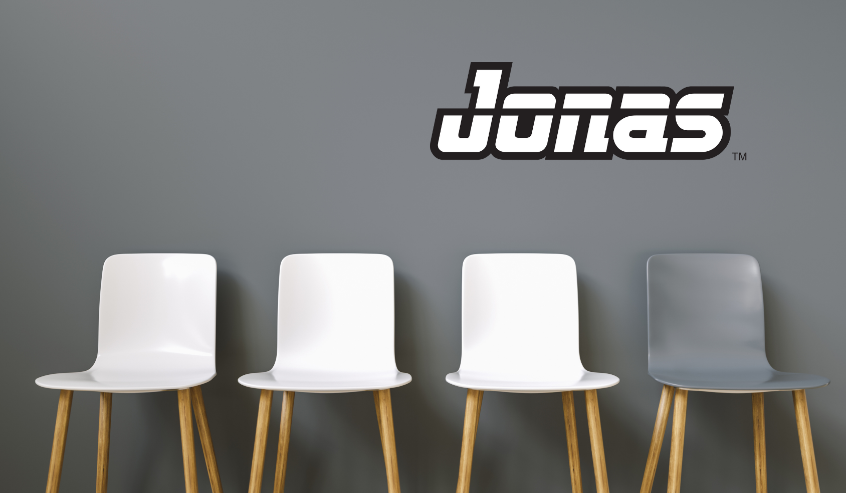 subsidiary divestment empty chairs against a wall